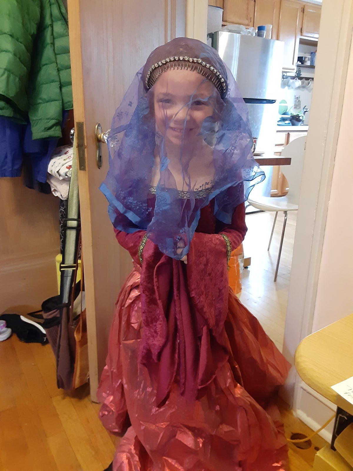 Millie explores the dress up box MLTSHP