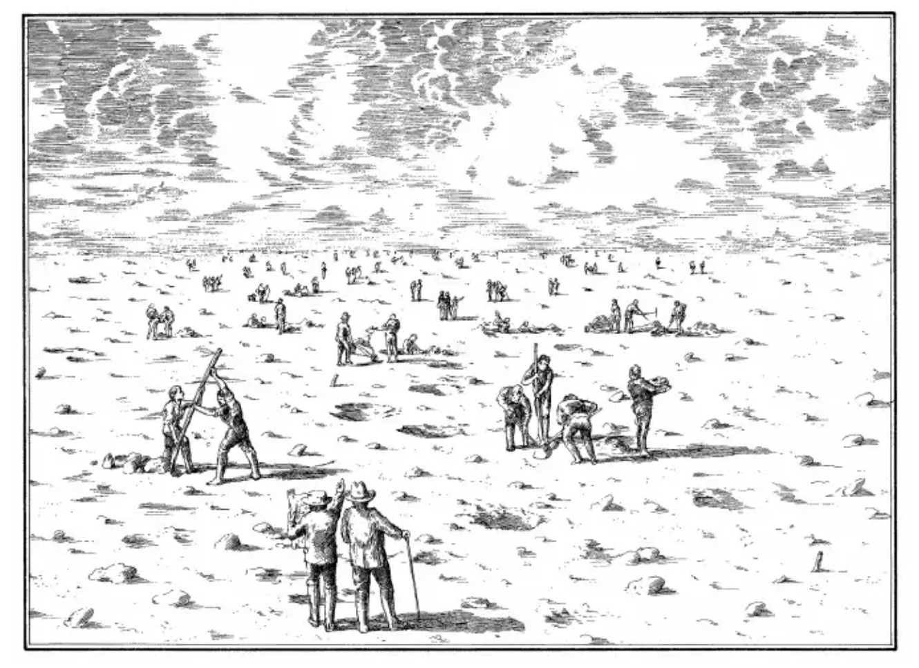 A rocky plain contains roughly a score of men with tools and hats.